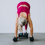 woman doing a pike with heroboard